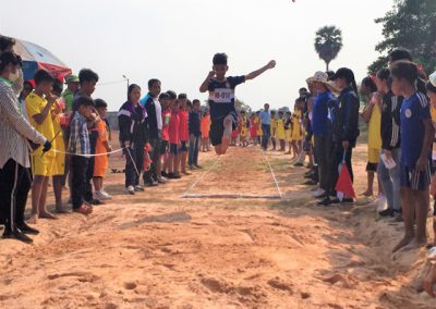 Primary school student in long jump