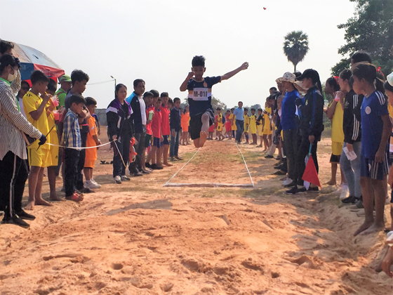 Primary school student in long jump